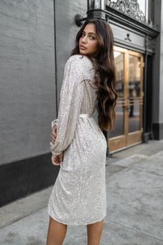 Sequin wrap dress midi Ivory color Adjustable Satin belt Model wearing size: Small Model height: 5'7 Sequin Wrap Dress, Wrap Dress Midi, Satin Belt, Dress Midi, Ivory Color, New Arrival Dress, Girls Accessories, Plaid Shirt, Sun Hats