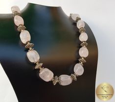 "◎ Necklace made from chunky beads of natural, rose quartz gemstone. Adorned with decorative filigree elements, everything is handmade from sterling 925 silver. ◎ Length: 46.8 cm ( 18.4\" ) Filigree cap diameter: 11 mm ( 0.43\" ) ◎ Enter the shop, for more of our jewelry, and matching earrings ;) ◎ - - - - - - - - - - - - - - - - - - - - - - - - - - - - - - - - - - - - - - - - - - - - - - - - - - Jewelry will be packed in a gift box and gift bag, and shipped in a padded envelope. - - - - - - - - Luxury Pink Rondelle Necklace, Pink Quartz Necklace, Pink Bead Necklace, Pink Stone Necklace, Pink Beaded Necklace, Beaded Rose, Large Bead Necklace, Beaded Necklace Designs, Filigree Necklaces