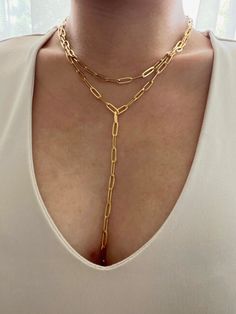 "Double chain lariat necklace or lariat necklace. Necklace features a paperclip lariat necklace with an attached rounded necklace for a layering look. Lariat necklace hangs 17\" from neck with a 4\" drop. Double chain lariat hangs 17\" from neck with a 4\" drop with a 16\" paperclip choker. Custom size can be requested in customization box. Necklace is gold plated stainless steel. It is of great importance to me that I make jewelry for my customers that I, myself, wear every day. Each jewelry pi Gold Chain Link Lariat Necklace, Elegant Double Chain Lariat Necklace Gift, Elegant Double Chain Lariat Necklace As Gift, Elegant Lariat Necklace With Double Chain As Gift, Dangle Double Chain Necklace As Gift, Dangle Double Chain Necklace For Gift, Double Chain Lariat Necklace, Minimalist Double Chain Lariat Necklace, Double Chain Paperclip Necklace For Gift