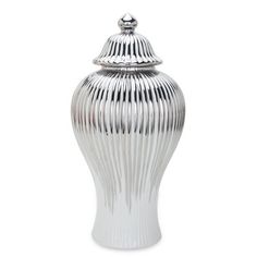 a large silver vase with a lid on the top and lines in the bottom, sitting against a white background