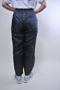 "Vintage women black skiing pants, retro snow trousers, Size M Welcome to TARASCOMMON.ETSY.COM Unique clothing from the 20th century. Model tall - 170cm Size: M. 14/164 - size on the tag. Width - 29-45cm / 11.41-17.71inch; Length - 105cm / 41.33inch. Hips - 50cm/ 19.68inch; Front rise - 31cm/ 12.2inch; All measurements are taken seam to seam while lying flat. Polyester/ Nylon; Belt. This item is vintage, so it can have some defects. Additional photos can be send We are glad that you are interest Retro Winter Streetwear Bottoms, Casual Black Pants For Ski Season, Black Full-length Pants For Winter Sports, Full-length Black Pants For Winter Sports, Black Full Length Skiing Pants, Black Full Length Pants For Winter Sports, Sporty Black Pants For Ski Season, Black Sporty Bottoms For Ski Season, Full Length Black Pants For Winter Sports