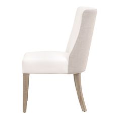 a white upholstered chair with wooden legs