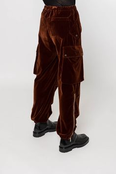 From Dries Van Noten's Fall/Winter 2024 collection, these v cargo pants elevate utilitarian design with plush cotton velour. Features include an elasticized drawstring waist, four-pocket styling plus cargo pockets at outseams, zip-fly, and elasticized cuffs with zip vents. The pants embody the designer's signature blend of luxury and functionality. Cargo Coat, Utilitarian Design, Charlotte Chesnais, Craig Green, Scarf Shirt, Shirts For Leggings, Fall Winter 2024, Pleats Please Issey Miyake, Cape Coat