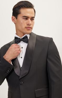 DETAILS Presenting the Black Satin Shawl Lapel Tuxedo – a timeless masterpiece that seamlessly blends sophistication and style. This tuxedo features a sleek shawl lapel, a single-button closure, and two front pockets for a classic yet refined look. The luxurious satin material not only adds a subtle sheen to the jacket but also elevates its overall elegance. The single-button closure, a classic design element, provides a touch of simplicity and sophistication. With three interior pockets, this t Turkey Pants, Shawl Lapel Tuxedo, Shawl Collar Tuxedo, Satin Shawl, Satin Noir, Tuxedo Pants, Tuxedo Jacket, Satin Material, Dress Pant