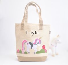 a personalized tote bag with a unicorn on it