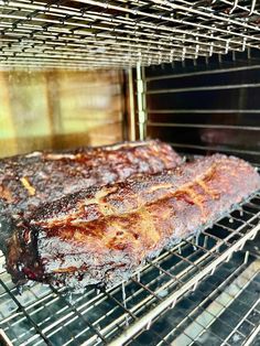 some meat is cooking in an oven and it looks like they have just been cooked