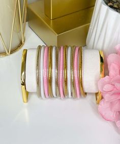 Introducing our "Sassy Stack Bracelet Set" in Pink/Gold/White, a fabulous collection of bangle bracelets designed to add flair and personality to your ensemble. This set features twelve jelly tube bangle bracelets in a delightful combination of pink, gold, and white, offering versatility and style in one chic package.
Crafted with high-quality materials, these bangle bracelets are both durable and fashionable. The jelly tube design adds a modern and playful touch to your look, while the vibrant colors ensure you stand out from the crowd.
Whether you wear them stacked together for a bold statement or mix and match with other bracelets, the "Sassy Stack Bracelet Set" is sure to turn heads wherever you go. Perfect for both casual outings and special occasions, these bracelets allow you to exp Cute Pink Bangle Stretch Bracelet, Trendy Pink Stackable Stretch Bracelet, Adjustable Stackable Pink Bangle, Elegant Pink Stackable Stretch Bracelet, Pink Adjustable Stretch Bracelet, Fun Style, Tube Design, Stack Bracelet, Black Friday Christmas, Beach Birthday