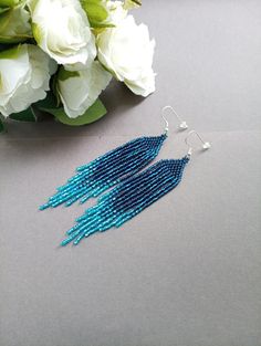 "These blue beaded Dangle earrings pair amazingly with any outfit, dressy or casual.  They are made of high-quality Czech colored beads with steel . Colors: blue Length: 4.5 inches (11.5 cm) Width: 0.8 inches (2 cm) Materials: Czech \"Preciosa\" beads Durable synthetic thread" Boho Earring, Beaded Dangle Earrings, Earrings Blue, Seed Bead Earrings, Earrings Boho, Czech Beads, Fringe Earrings, Beaded Jewelry Diy, Bead Earrings