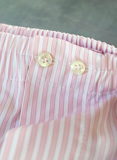 The styling of our woven Perfect Boxer in Light Pink Stripes has been meticulously honed to provide the perfect rise and fit. The fit does away with all excess, baggy fabric and is as comfortable when worn under a pair of slim 5-pocket jeans as under dress pants. Our boxer features bespoke details found only in exclusive custom-made boxers. There are two operable buttons at the waist, as well as a functional fly opening. The waistband elastic is fully covered with pleated fabric running the length of the waist, further enhancing comfort by eliminating skin contact with elastic. Crafted from our super soft Light Pink Stripes cotton shirting fabric. Please note that for hygienic reasons, we cannot accept returns on underwear, unless due to defects in quality or workmanship.• Modern Fit• 100% Under Wears Men, Shirting Fabric, Simple Fits, Striped Pyjamas, Closet Makeover, Fall Wear, Custom Buttons, Mens Boxers, Brand Development