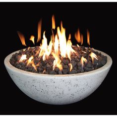 a white bowl filled with lots of fire