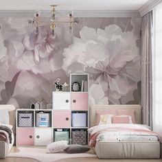 a bedroom decorated in pink and white with flowers on the wall, bedding and dressers