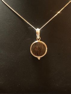 "Sterling silver round beaded pendant made with your pets hair or my stock hair you choose. The center has the hair encased in it, so the color of the mane/tail hair will be the color of the center stone..  14MM ROUND  CAN BE MADE WITH ANY PET HAIR/FUR, DOG, CAT, HORSE, ALSO CAN BE MADE WITH CREMATION ASH This is Sterling Silver 1/2\" I need a 4 inch pencil round section of hair for this piece. PLEASE KEEP IN MIND BEFORE ORDERING: *I can combine the hair of more than one  and place them in the s Dog Hair Necklace, Horse Hair Necklace, Horse Hair Braiding, Horse Hair Tassels, Horse Hair Pottery, Horse Hair Jewelry, Hair Necklace, Tail Hair, Memorial Pendant