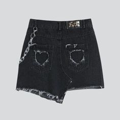 Introducing our 2023 Spring-Summer Collection: the raw hem asymmetric denim skort. street style. An iconic fashion piece that blends streetwear and modern style. this mid-waist skort with zipper and button closure is sure to turn heads.Why You'll Love It: Raw Hem: An edgy finish that will elevate any look. Asymmetric: A unique silhouette that adds a touch of drama. Mid-Waist: Comfortable and flattering for all body types. Zipper & Button Closure: Easy to put on and ensures a perfect fit. Be Bold Edgy Streetwear Shorts For Spring, Punk Style Mini Denim Skirt For Summer, Edgy Jean Shorts For Spring Streetwear, Grunge Mini-length Bottoms For Streetwear, Edgy Jean Shorts For Spring, Edgy Denim Cutoff Mini Skirt, Y2k Streetwear Cutoff Bottoms, Edgy Cutoff Denim Skirt, Trendy Short Denim Skirt For Streetwear