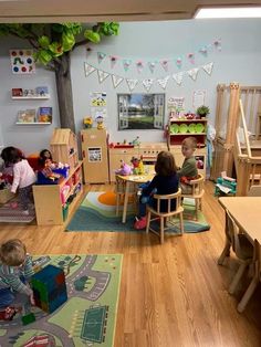 children are playing in their playroom with toys