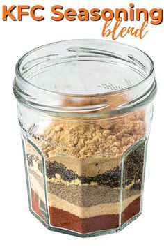 a jar filled with different types of seasoning next to the words kfc seasoning blend