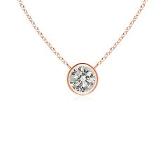 This bezel-set pendant necklace, crafted in 18k rose gold, is a perfect mix of extravagance and simplicity. The solitaire diamond pendant is attached to the chain by the loops. Cut in a classic round shape, the diamond shines with unmatched brilliance. Choose from different stone qualities (K, I3, I-J, I1-I2, H, SI2, GH VS) and multiple total carat weight options. Solitaire Diamond Pendant, Solitaire Necklace, Solitaire Pendant Necklace, Diamond Solitaire Necklace, Solitaire Necklaces, Solitaire Diamond, Solitaire Pendant, Diamond Solitaire, Bezel Setting