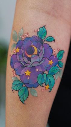 a purple rose with stars and crescent on it's left arm, done by an artist