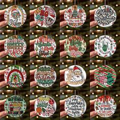 a bunch of christmas badges are hanging on a wall in front of some lights and decorations