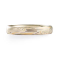 "This gorgeous custom Mokume Gane ring features our Twist Pattern and is made in our Flare Palette with a flat profile and an etched finish. The Flare palette consists of 14kt Yellow Gold, Palladium, and Sterling Silver. Pattern: Twist Palette: Flare Finish: Etched Width Shown: 3mm Size Shown: 5.5 Profile: Low Dome Price does NOT include stones or setting fees. Prices quoted are for rings up to size 9.75 unless otherwise noted. Ring sizes 10 and larger have an additional $150 metals fee. We care Modern Etched Jewelry For Wedding, Modern Etched Jewelry For Anniversary, Mokume Gane Ring, Woodgrain Pattern, Twist Pattern, Mokume Gane, Ring Sizes, Size 10 Rings, Black Box