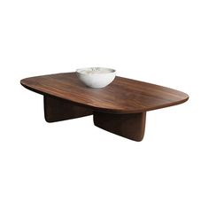 a wooden table with a white bowl on it's top and two legs in the middle