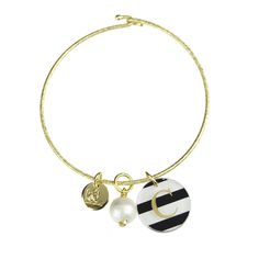 What's a girl without her pearl? This timeless, classic pearl is just what you need to complete your charm bracelet look. Click here to shop our charm bar. Charm Measurements (approximate): Mini - 0.4" Small - 0.5" Medium - 0.6" Large - 0.8" Materials: Cotton pearl; gold filled (sterling silver base with gold finish) or sterling silver findings Production: Ships in 1 to 2 business days* Be sure to specify which charms you want placed on what piece of jewelry by noting that in the comments sectio Classic Personalized Pearl Jewelry, White Metal Charm Bracelet, Classic Pearl Charm Bangle Jewelry, Classic Pearl Charm Bangle, Elegant Pearl Charm For Everyday, Elegant Pearl Charm, Elegant Everyday Pearl Charm, Personalized White Pearl Charm Jewelry, Personalized White Jewelry With Pearl Charm