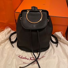 Excellent Condition Like New!! Used Once!!! Pet/Smoke Free Home. Comes With Dust Bag. Elegant Bucket Backpack For Travel, Luxury Black Leather Backpack With Gold-tone Hardware, Elegant Backpack With Branded Hardware, Elegant Leather Backpack With Dust Bag, Elegant Black Backpack With Gold-tone Hardware, Bucket Backpack, Adidas Backpack, Studded Backpack, Salvatore Ferragamo Bags