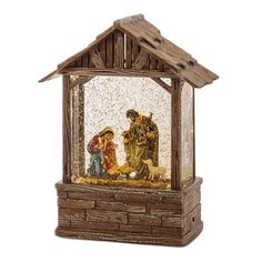 the nativity scene is displayed in a wooden frame with glass and wood trimmings