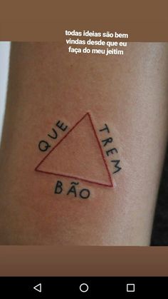 an image of a tattoo on the arm that says que trem ba oo