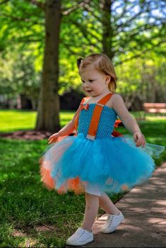 Blue and orange tutu for birthday or play! Fully adjustable straps tie in the back Listing is for the dress only, does not include any accessories or props shown in the photos. - - - - - Follow the latest creations in our Facebook VIP group : https://www.facebook.com/groups/565296100636029/?source_id=1558400910881552 This adorable tutu style dress is perfect for Birthdays, Halloween, or just for dress up. Tutu dresses also photograph beautifully. The 100% Nylon tulle holds its shape and the croc Playful Blue Tutu Dress For Summer, Playful Tutu Dress For Spring Costume Party, Playful Spring Tutu Dress For Costume Party, Playful Fitted Tutu Dress For Costume, Cute Blue Tutu Dress For Costume Party, Playful Fitted Tutu Dress For Costume Party, Summer Princess Tutu Dress For Costume, Spring Costume Tulle Tutu Dress, Spring Tulle Tutu Dress For Costume