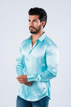 Measurements: Model is wearing size Medium. Fabric: Satin Fit: Relaxed fit About: This solid-colored satin dress shirt from Platini Jeans will enhance your fashionable wardrobe. The head-turning color adds flair to the classic long sleeve shirt. A relaxed fit delivers sleek style, and the point collar provides a modern finishing touch. Details & Features: Satin Point Collar Long sleeve Button closure Modern Fit Machine Washable Classic style Fitted Long Sleeve Dress Shirt For Party, Fitted Long Sleeve Party Dress Shirt, Slim Fit Long Sleeve Dress Shirt For Party, Elegant Spring Party Dress Shirt, Semi-formal Fitted Satin Shirt, Sleek Collared Satin Shirt, Sleek Satin Collared Shirt, Fitted Satin Shirt For Party, Fitted Satin Party Shirt