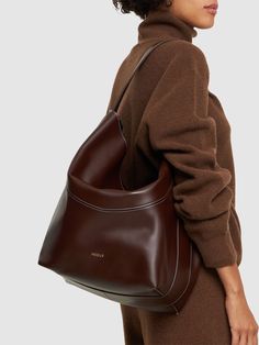 Height: 36cm Width: 50cm Depth: 25cm. Handle drop: 36cm. Fixed top handle. Top flap with magnetic closure. Includes one internal pouch Classic Brown Top Handle Hobo Bag, Classic Top Handle Hobo Bag For Business, Timeless Brown Shoulder Bag With Handle Drop, Classic Business Hobo Bag With Top Carry Handle, Classic Hobo Bag With Top Carry Handle For Business, Classic Business Hobo Bag With Double Handle, Classic Double Handle Hobo Bag For Business, Luxury Hobo Bag With Top Carry Handle For Business, Luxury Business Hobo Bag With Top Carry Handle