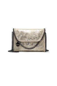 The Metallic Cartney Bag is the ultimate versatile accessory. Made from durable vegan leather, it features a unique chain trim and can be worn as a shoulder bag, crossbody, or luxurious clutch. Add an effortless edge to any outfit with this signature style! Magnetic Closure Interior Zip Pocket Interior Slip Pocket Adjustable Chain Strap: 47 inches Bag Size: 11.5 x 7.5 x 3 inches Suede Clutch, Stockholm Style, Woman Bags Handbags, Timeless Accessories, Shoulder Messenger Bag, Small Handbags, Chain Shoulder Bag, Branded Bags, Chain Bags