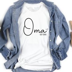 a t - shirt with the word oma on it