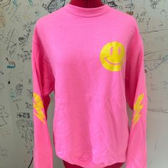 Hot Pink Smiley Face Sweatshirt With Lightning Bolts On The Sleeves! Small Imperfections In The Lightning Bolt Printing (See Photos) But They Are Not Noticeable Unless You Look Very Closely. Super Soft Sweatshirt And Perfectly Trendy! Trendy Crew Tops With Screen Print, Trendy Spring Crew Neck Tops, Trendy Crew Neck Top For Spring, Pink Crew Top For Spring, Pink Crew Neck Top For Spring, Casual Pink Crew Neck Tops, Casual Smiley Face Top For Fall, Trendy Long Sleeve Tops With Smiley Face, Trendy Smiley Face Tops For Fall