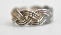 "Rope ring braided pinky band sterling silver women girls Size 5.25 Weight 3.7g Band width 1/4\" Free Domestic Shipping and Free Postal Insurance Delivered in a gift Box If you do not want the ring polished and want to leave the natural patina please let me know at the time of purchase as I do polish rings before I ship rings out. Thanks USPS Domestic Shipping is free for buyers. If a buyer prefers to upgrade to priority, the buyer will pay that portion of the shipping charge. If the actual cost Poison Ring, Rope Ring, Rope Rings, Braided Ring, Metal Chain Link, Sterling Silver Bands, Silver Band, Stone Rings, Beautiful Rings