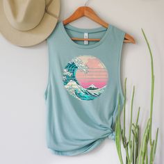 Thank you for visiting my shop! Please feel free to reach to me with anything you need! Best, Aly :) Distressed waves muscle tank. Nature Tank, Muscle Tank, Beach Tanks, Cute Tank Top, Yoga Tank Top, Workout Tank Top, Wave Shirt, Festival Tanks These muscle tanks are super lightweight, durable, and designed for a relaxed fit. With elongated arm holes these tops are perfect for layering over a sports bra or a bathing suit. Sizing: The reviews on sizing are mixed. If you have a larger bust you'll Sleeveless Letter Print T-shirt For Beach, Sleeveless Graphic Print T-shirt For Vacation, Crew Neck Cotton Tank Top For Beach, Sleeveless Beach T-shirt With Graphic Print, Casual Workout Tops With Sublimation Print, Summer Crew Neck Tank Top With Graphic Print, Summer Muscle Tee With Crew Neck And Screen Print, Summer Workout T-shirt With Screen Print, Crew Neck Top With Custom Print For Beach Season