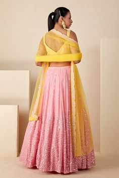 Pink flared lehenga with attached can-can, all over abstract pattern, tonal thread and sequin hand embroidery. Paired with contrast yellow padded blouse with all over abstract pattern, thread hand embroidery and floral embroidered bordered dupatta. - Aza Fashions Fusion Pre-draped Saree For Wedding And Diwali, Fusion Style Fitted Dupatta With Traditional Drape, Fusion Style Pre-draped Saree With Dupatta For Wedding, Fitted Fusion Choli With Traditional Drape, Fitted Fusion Style Dupatta With Traditional Drape, Fitted Fusion Style Sets For Festivals, Festive Fusion Style Fitted Dupatta, Fitted Fusion Style Festival Sets, Festive Fusion Lehenga For Wedding