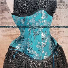 "Brand New underbust corset from \"MystiC City Corsets\" design: MCC-44L color: Picture ( teal cherry brocade) - 100% cotton twill lining - Steel boned (18 x 6mm wide spiral steel bones, 6 x 12mm wide flat steel bones ) - Front busk(black) - Underbusk - Steel boned floating modesty panel - regular \"shoe\" style lace Front: 11.25\" Side: 9-10.5\" Back: 12\" Busk: 9.75\" (black, Flexible) available sizes: 18\", 22\", 24\" ,26\", 28\", 30\", 32\" , 34\", 36\"" Blue Overbust Corset For Costume Party, Blue Fitted Corset For Costume Party, Blue Underbust Corset With Fitted Bodice, Blue Fitted Underbust Corset Dress, Blue Corset With Boned Bodice, Blue Overbust Corset With Boned Bodice, Blue Underbust Corset With Boned Bodice, Fitted Blue Corset With Corset Back, Blue Fitted Corset With Corset Back