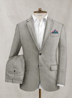 For the perfect smart-casual statement, opt for our Solbiati Gray Seersucker Suit that keeps you updated with the latest street style trends. Crafted from cotton, the white-gray stripe will give a touch of stylish effortlessness and exude the most classic look. Wear this seersucker suit during warm weather at family reunions, engagement parties, work events or anniversaries. 
 
 Seersucker name comes from the persian word: "SHUR E SHAKAR" which means sugar and milk, signifying the alternation of Seersucker Suit Wedding, Nantucket Wedding, Royal Blue Suit, Seersucker Suit, Suit Collection, At Family, Beautiful Suit, Looking Dapper, Custom Suit