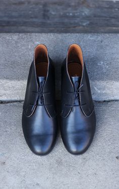 Minimalist, comfortable and soft. Usually casual, but if needed will fit into a more elegant outfit. Long-distance shoes, can be worn at any time in the year together with pants or dresses. Every shoe is handmade of all-natural leather, in a small family manufacture, with decades-long experience. UPPER: full grain natural leather, colour: black matt INSIDE: natural goat leather, beige SOLE: black, tuni leather HEEL: 1,5 cm Our handmade shoes hold a 2-year guarantee, however, they last longer wit Black Ankle Chukka Boots For Fall, Fall Black Leather Chukka Boots, Everyday Ankle Boots With Rubber Sole, Fall Leather Black Chukka Boots, Black Ankle-high Chukka Boots For Fall, Black Chukka Boots With Rubber Sole For Fall, Black Round Toe Chukka Boots For Fall, Black Chukka Boots With Round Toe For Fall, Everyday Black Leather Boots