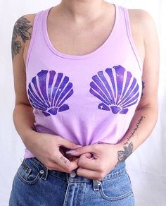 ↓↓↓ Were loaded with a variety of different mermaid tops! ↓↓↓ • Check out the tanks & tees here: https://www.etsy.com/shop/TheBohipstian?ref=l2-shopheader-name&section_id=20062827 • Check out the sweatshirts here: https://www.etsy.com/shop/TheBohipstian?ref=l2-shopheader-name&section_id=20062833  For days you dont feel like wearing your *actual* mermaid bra, weve got you covered! These mermaid shell tanks are a MUST HAVE!... The Little Mermaid Halloween Costume, Little Mermaid Halloween Costume, Galaxy Mermaid, Mermaid Halloween Costume, Mermaid Tank, Mermaid Tank Top, Mermaid Stuff, Galaxy Shirt