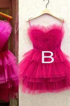 Fancyvestido this short hot pink homecoming dress features a sweetheart neckline with ruffles, a tiered a-line skirt, and a zipper back. ♡ SKU: FV11675♡ Fabric: Tulle♡ Size: US 2-16. True to the size chart. Check our Size Chart to get your correct size.♡ Besides stand sizes 2-16, we still offer free custom sizes. You can email me your specific size, before or after your order.Which requires the following measurements:Bust:___ inch/cmWaist:___ inch/cmHips:___ inch/cmHollow to Hem___inch/cm (for t Pink Ruffled Mini Dress For Prom, Fitted Ruffle Dresses For Sweet 16, Sweet 16 Ruffled Dresses With Sweetheart Neckline, Sweet 16 Dress With Ruffles And Fitted Bodice, Sweet 16 Dress With Ruffles And Sweetheart Neckline, Homecoming Mini Dress With Sweetheart Neckline And Ruffles, Sweet 16 Dresses With Ruffles And Sweetheart Neckline, Sweet 16 Dresses With Sweetheart Neckline And Ruffles, Sweetheart Neckline Mini Dress With Ruffles For Homecoming