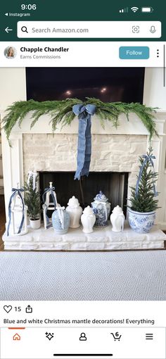 the fireplace is decorated for christmas with blue and white decorations on it's mantle