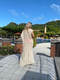 Whether you will wear it as an over-bikini cover-up, or as a dress on its own, you will be able to achieve an elevated look with our Collette Kaftan. Delicate and sophisticated, this linen kaftan will be a perfect fit at a resort by the sea, or at any poolside setting. You can also wear it as a tunic over a slip dress, shorts and even jeans. Collette Kaftan is one size. Due to its breathable transparency, you can purchase it together with our Leah cotton slip dress, that is available in sizes S, Beige V-neck Cover-up For Beach Party, Sleeveless Beach Kaftan For Summer, Spring Sleeveless Kaftan For Beach, Elegant Maxi Beach Tunic, Long Beige Beach Dress, Spring Sleeveless Beach Kaftan, Beige Long Beach Dress, Summer Beach Linen Tunic, Beach Maxi Linen Dress