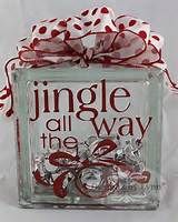 a clear square box with red and white polka dot ribbon on top that says, jungle all the way