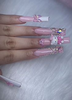 Unique Acrylic Nails Hello Kitty, Bling Rhinestone Nails, Big Hello Kitty Charm Nails, Long Square Acrylic Nails Hello Kitty, Pink Bling Nails Rhinestones Sparkle, Long Acrylic Nails Mexican, Pink Nails Bling Rhinestones, Big Charms On Nails, Xxl Long Acrylic Nails Pink