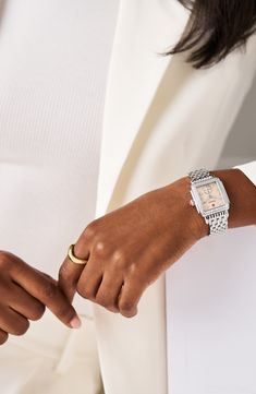 A total of 126 diamonds illuminates this elegant watch featuring a mother-of-pearl dial and high-shine square case housing accurate Swiss-quartz movement. The polished seven-link bracelet is interchangeable with any 16mm MICHELE strap—sold separately—to match any occasion or mood. 31mm case, 16mm band width Deployant clasp closure Swiss quartz movement Total diamond weight: 0.57ct. Color: G–H Clarity: SI1 Signature MICHELE crown Mother-of-pearl dial Sapphire crystal face Stainless steel/diamond Mw Logo, Michele Deco Watch, Diamond Watches Women, Multi Gemstone Bracelet, Silver Platforms, Deco Architecture, Bracelet Watches Women, Double Diamond, Diamond Guide