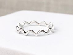 These delicate stacking rings are handmade of 925 sterling silver with a zigzag design and subtle oxidized contrast detail. It will only leave you with a beautiful shining ring, easy matching with any ring.  ✔ Nickel free - Hypoallergenic ✔ Perfect for sensitive skin ✔ Every order comes with a Beautiful gift box, ready for gifting WORLDWIDE SHIPPING All orders will ship within 1-2 working days once payment received * 3-5 working day for Australia wide * 10 -14 working days to USA * 14-20 working Wave Ring Silver, Delicate Stacking Rings, Plain Ring, Zigzag Design, Wave Ring, Ring Stacking, Stackable Ring, Stacking Ring, Beautiful Gift Boxes