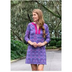 This Tunic Dress Is Enhanced With A Contrast Neckline And Our New Carolina Print With Purple And Pink Hues. Perfect For Fall, This Dress Is Made With Luxurious Fabric That Features A Heavier Weight To Keep You Protected During Cooler Temps. Wear It For Your Next Video Call Or Date Night, This Dress Is Made To Do It All. All Cabana Life Styles Are Complete With 50+ Uv Protection And Made For Everyday Style. 50+ Upf Protection Blocks 98% Of Uva + Uvb Rays Nylon/Spandex Breathable Wrinkle-Resist Terry Cloth Dress, Short Sleeve Floral Dress, Classic Shirt Dress, Wrap Romper, Sleeveless Shift Dress, Sport Dress, 80 Dress, 70 Dress, Swimsuit Cover Ups