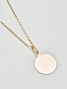 Sentimental? Same. The Disk Pendant handcrafted in L.A. from 14Kt gold is the perfect piece to engrave with a memorable message. Make it even more personal by stringing it from a chain of your choice. 14Kt Yellow Gold Disk Pendant Width: 20mm Sold solo with a silk cord Pictured with Petite Industrial Box Link Chain Shop all chain options Made in L.A. Gold Disc, Silk Cord, Disc Pendant, 14kt Gold, Link Chain, Havana, Gold Chains, Jewelry Watches, Gold Necklace